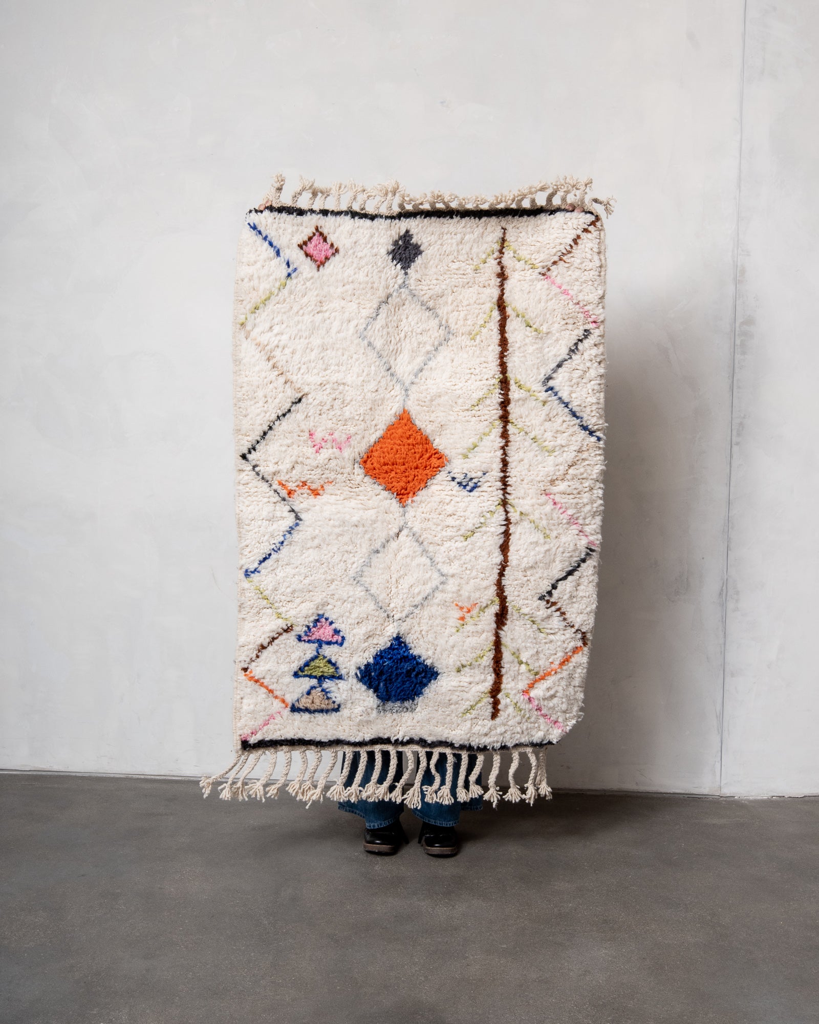 Modern, designer, handcrafted Berber rug from Morocco. Beniourain carpet with beautiful colours and patterns and fluffy wool texture.